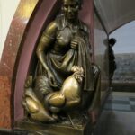 Bronze lady and chicken statue at Moscow Metro