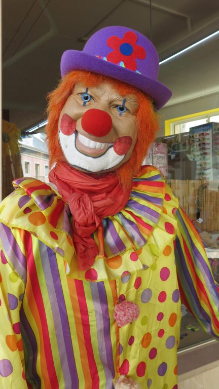 Clown in Lagos street, Lagos to Lisbon, Portugal family holidays