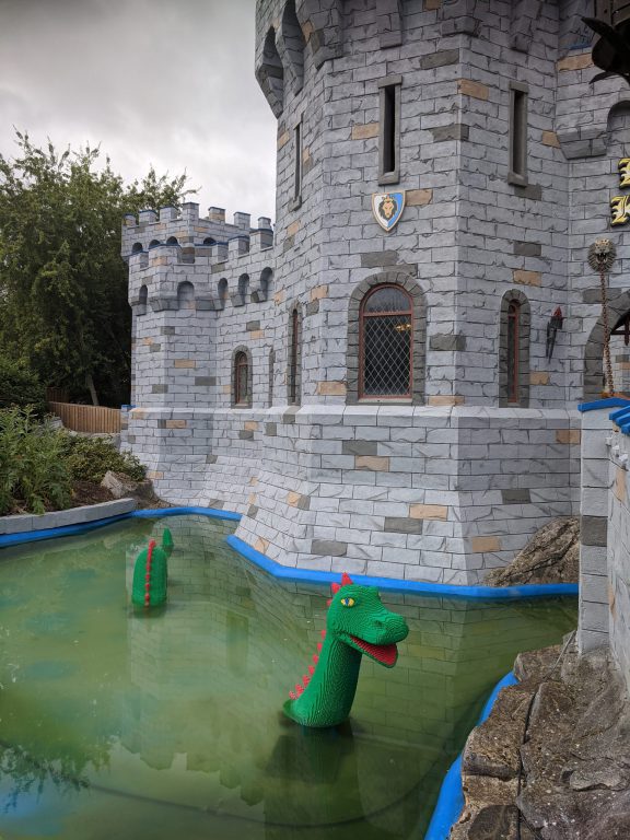 Dragon roller coaster castle moat