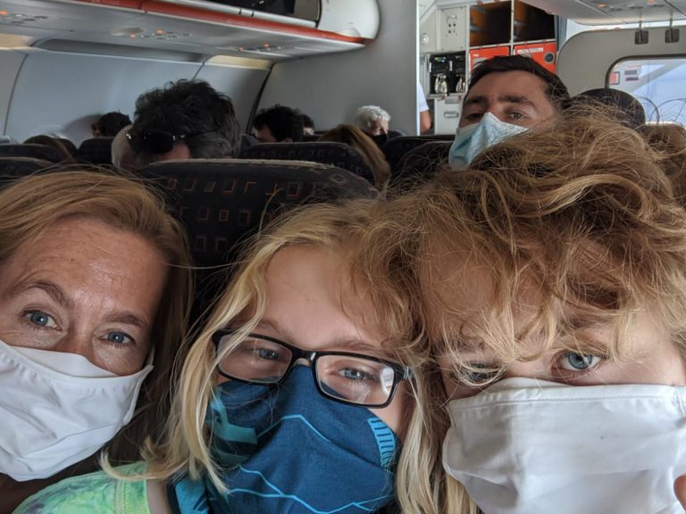Mask wearing on plane in Covid, Venice with kids