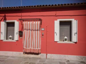 Coloured houses of Burano, Venice with kids