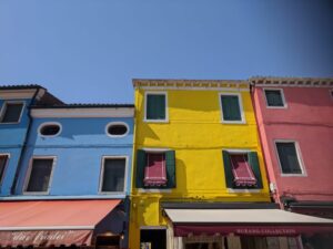 Coloured houses of Burano, Venice with kids