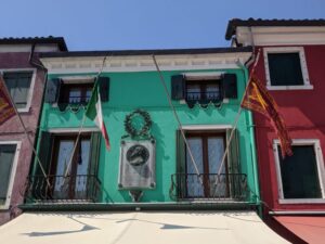 Coloured houses of Burano, Venice with kids