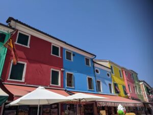 Coloured houses of Burano, Venice with kids