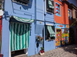 Coloured houses of Burano, Venice with kids