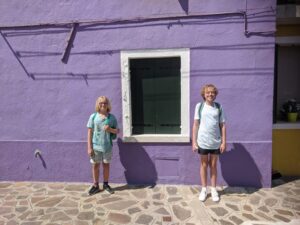 Coloured houses of Burano, Venice with kids