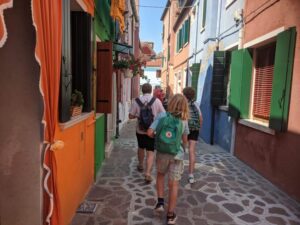 Coloured houses of Burano, Venice with kids