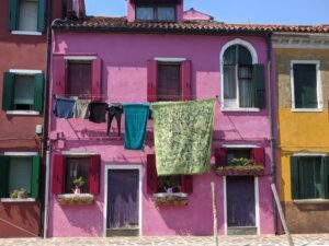 Coloured houses of Burano, Venice with kids