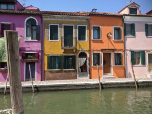 Coloured houses of Burano, Venice with kids