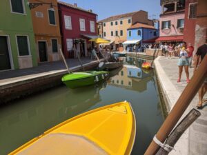 Coloured houses of Burano, Venice with kids