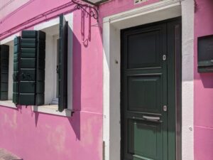 Coloured houses of Burano, Venice with kids