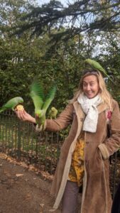 Feeding the parakeets in Hyde Park, London itinerary with kids, things to do in London with teens