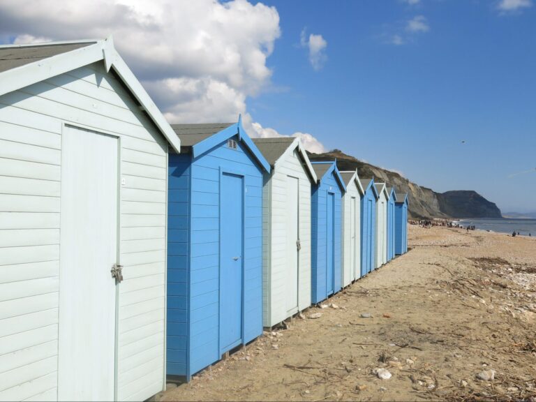 Beach huts at Charmouth, best holiday parks South West