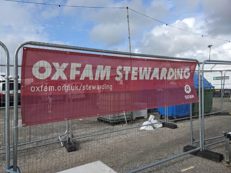 Oxfam stewarding sign